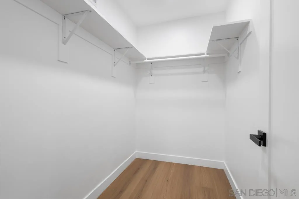 4516 Shade Road La Mesa, CA 91941 - Photo 14 of 33 a view of a room with shelf on the wall