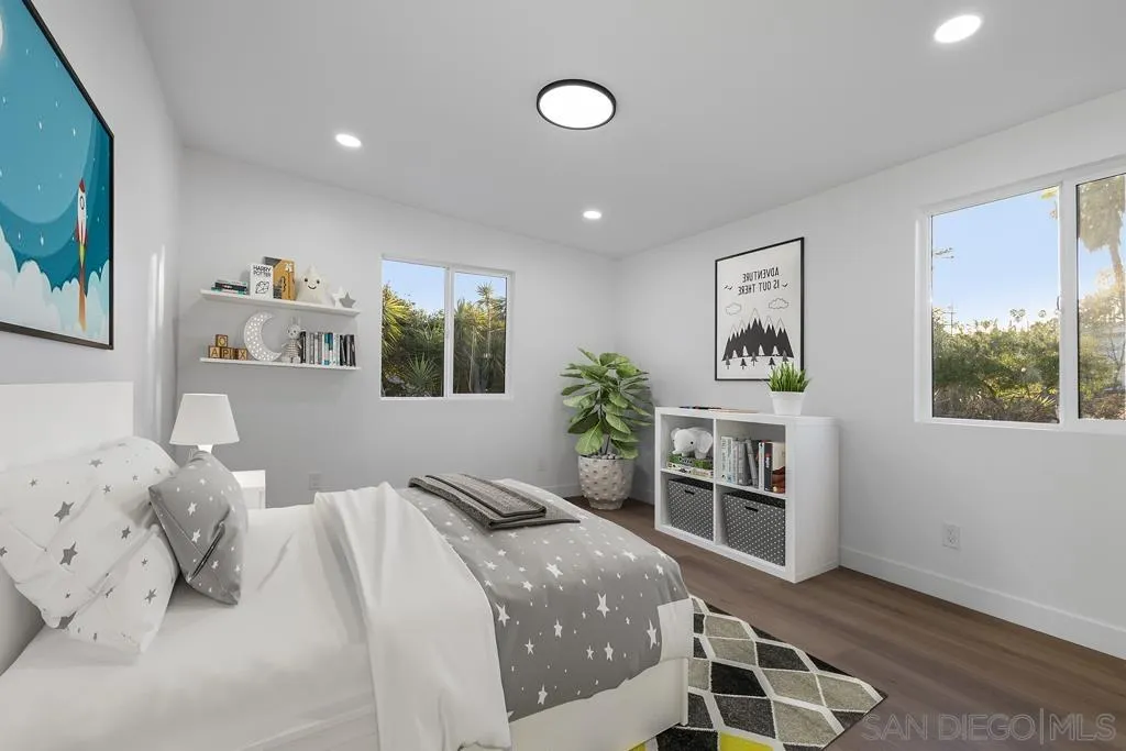 4516 Shade Road La Mesa, CA 91941 - Photo 20 of 33 a bedroom with a bed and a window