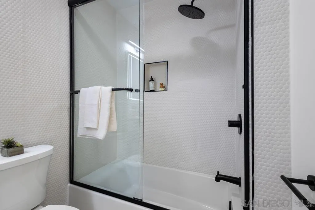 4516 Shade Road La Mesa, CA 91941 - Photo 23 of 33 a bathroom with a shower