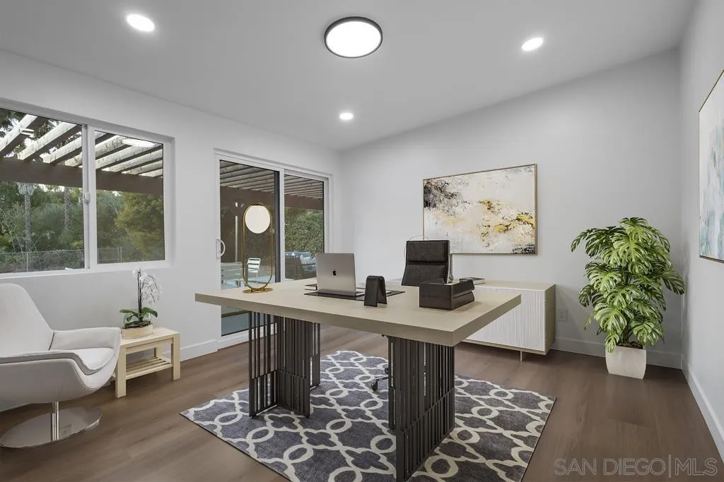 4516 Shade Road La Mesa, CA 91941 - Photo 24 of 33 a view of a workspace with furniture and a potted plant