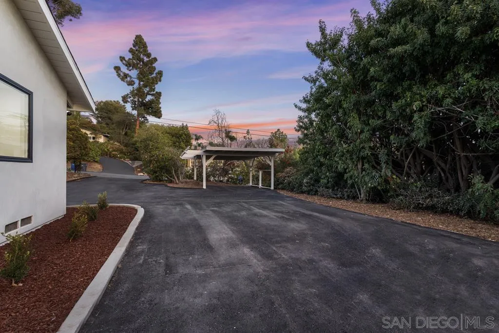 4516 Shade Road La Mesa, CA 91941 - Photo 30 of 33 a view of a backyard with sitting area