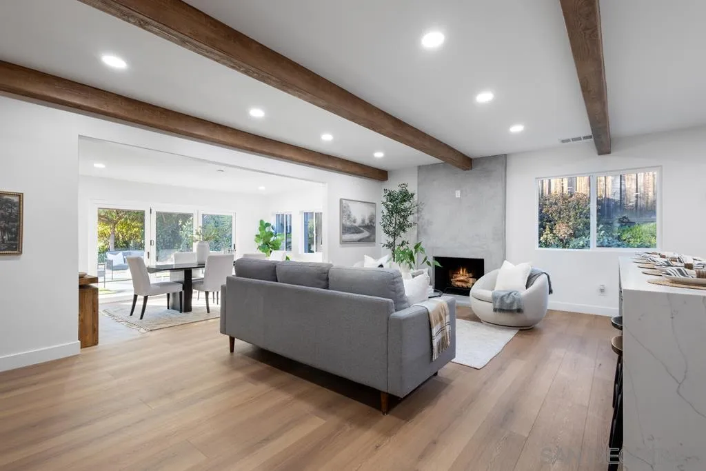 4516 Shade Road La Mesa, CA 91941 - Photo 8 of 33 a living room with furniture two large window and a wooden floor