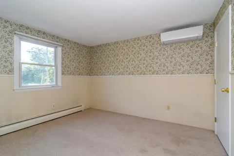 an empty room with a window