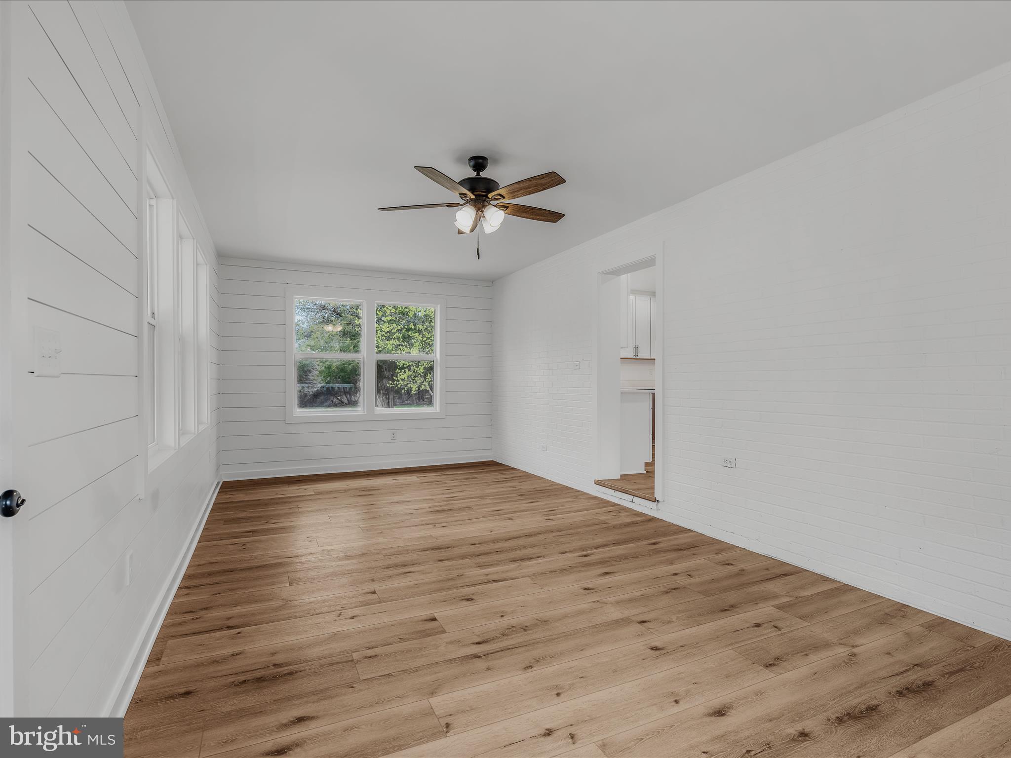 89 Morgan Grove Road Shepherdstown, WV 25443 - Photo 15 of 68 wooden floor in an empty room with a window