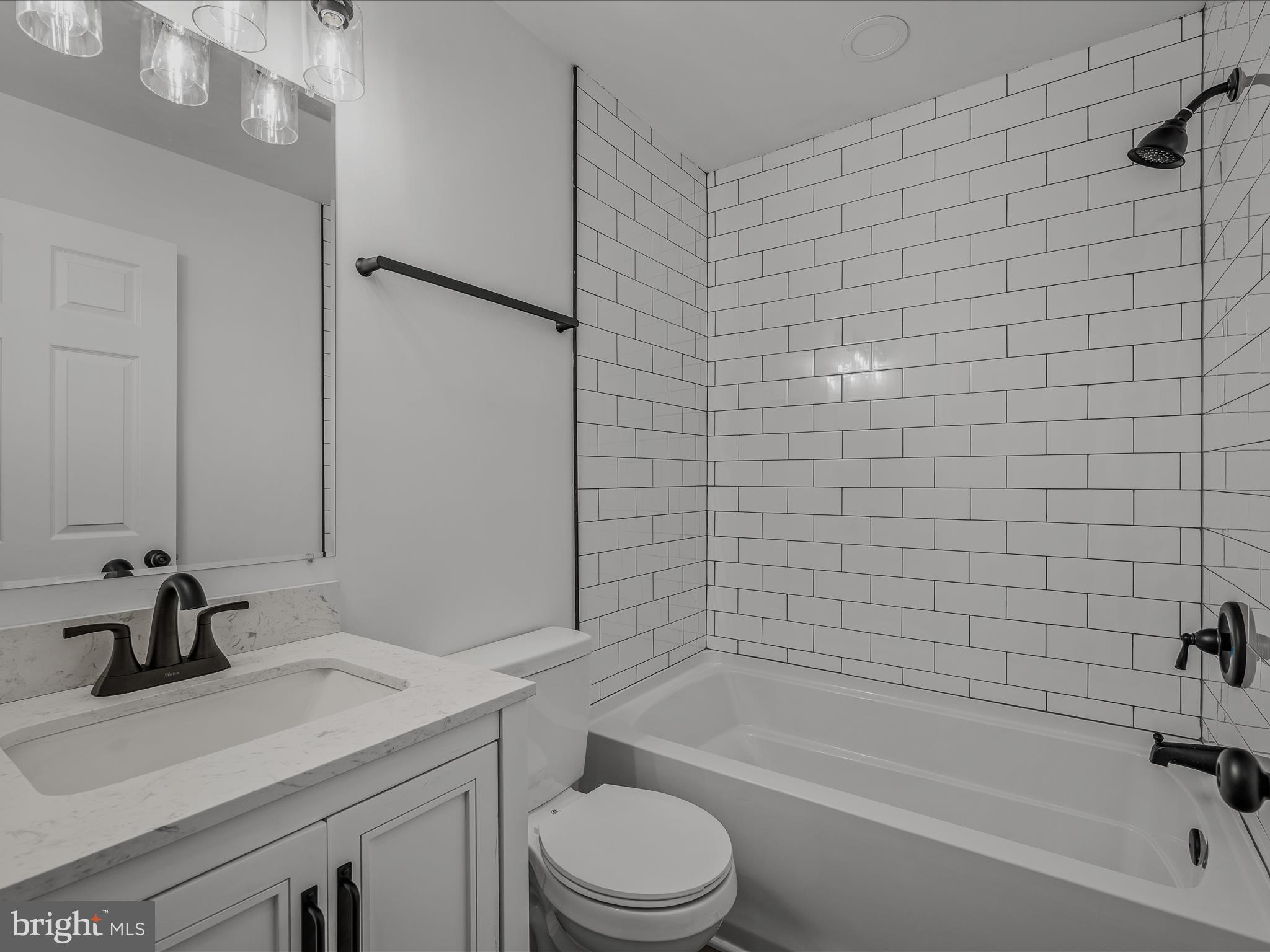 89 Morgan Grove Road Shepherdstown, WV 25443 - Photo 27 of 68 a bathroom with a sink a toilet and a bathtub