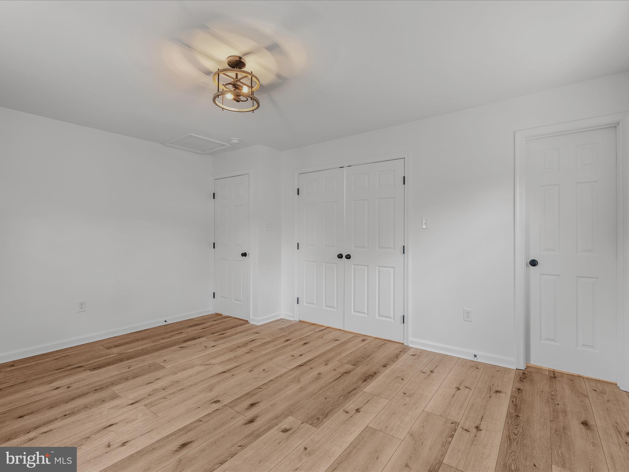 89 Morgan Grove Road Shepherdstown, WV 25443 - Photo 29 of 68 a view of a room with wooden floor and a ceiling fan