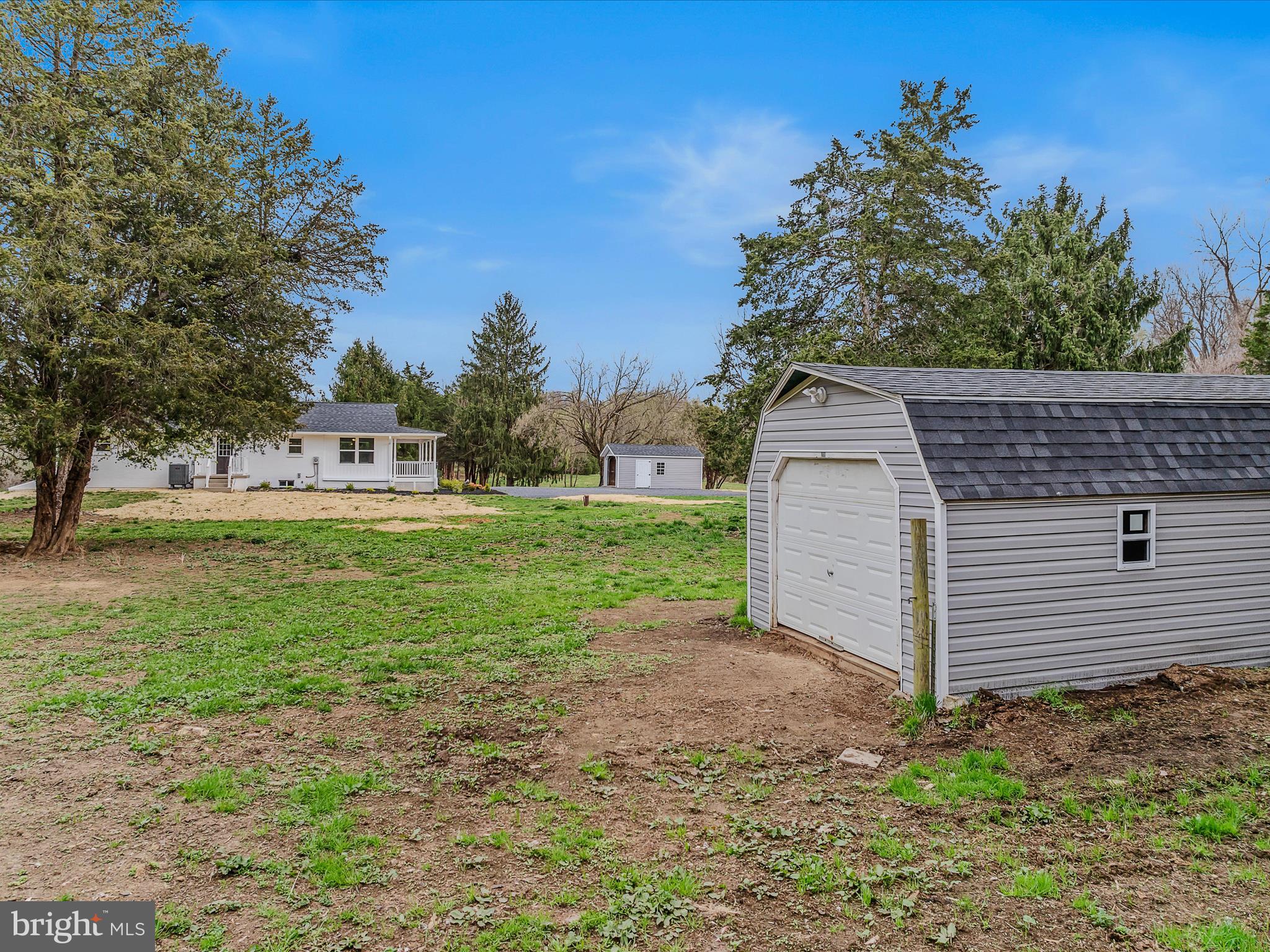 89 Morgan Grove Road Shepherdstown, WV 25443 - Photo 50 of 68 a view of a house with a yard