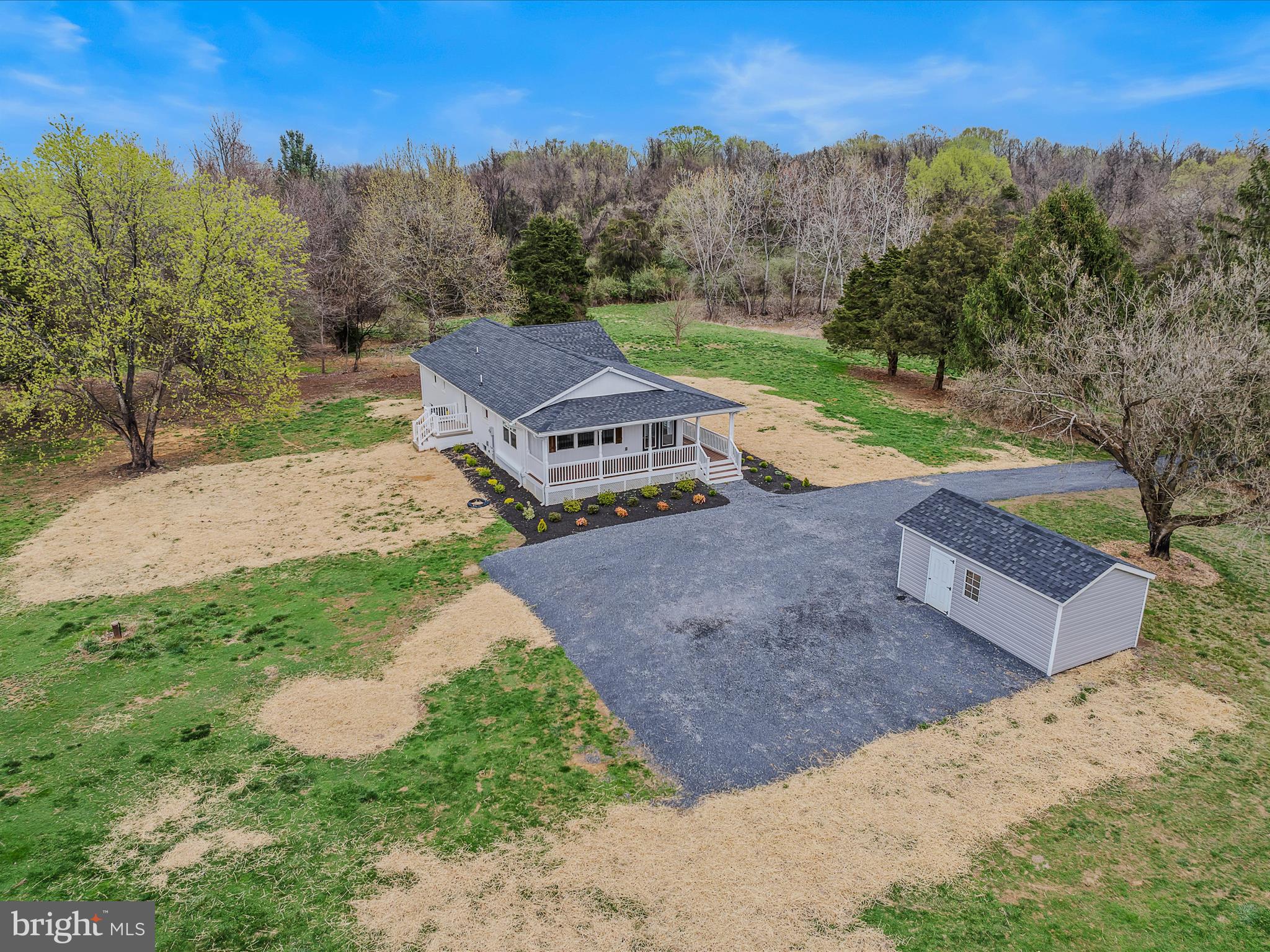 89 Morgan Grove Road Shepherdstown, WV 25443 - Photo 52 of 68 an aerial view of a house with a garden