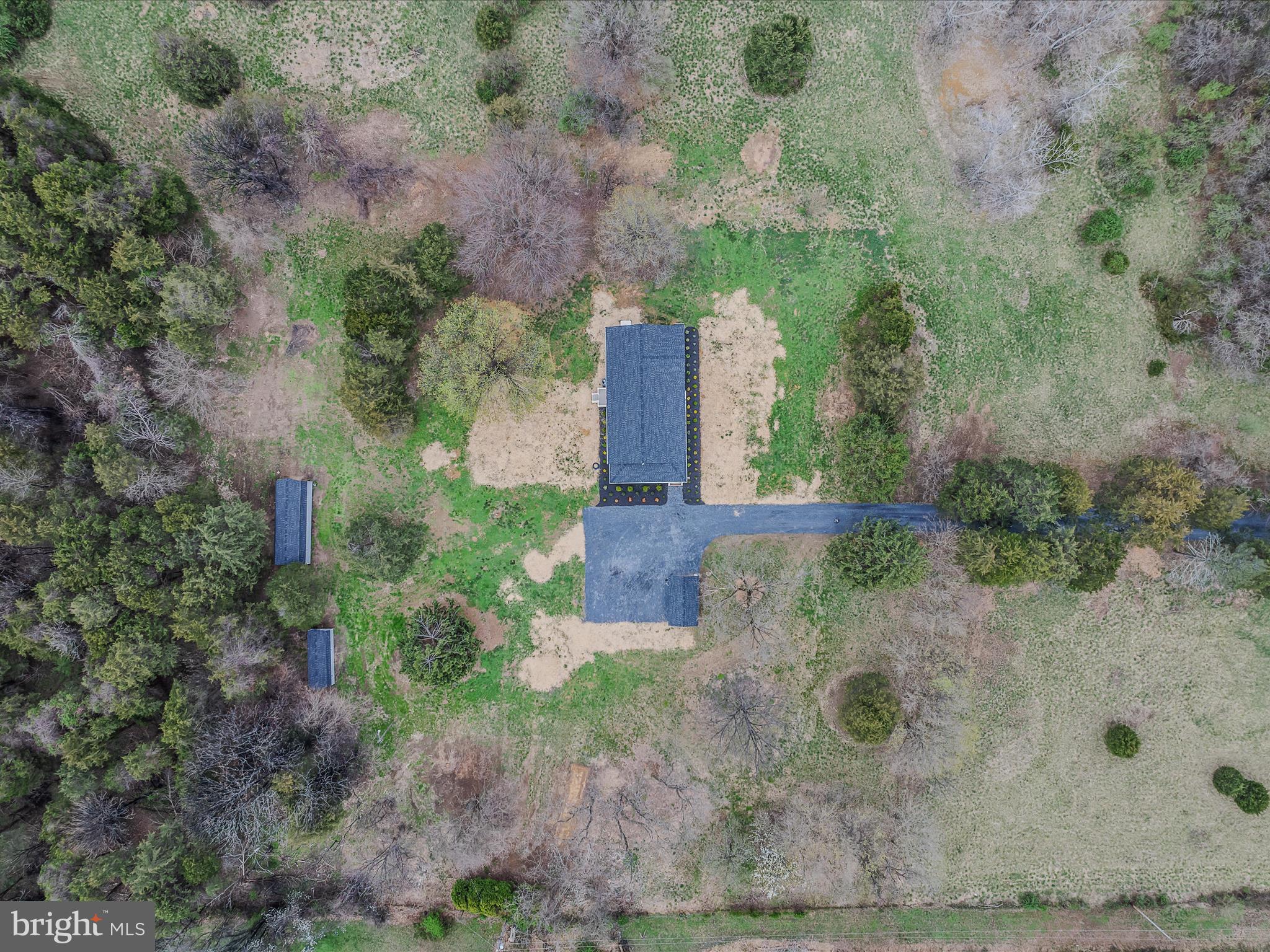 89 Morgan Grove Road Shepherdstown, WV 25443 - Photo 54 of 68 an aerial view of a house with a yard