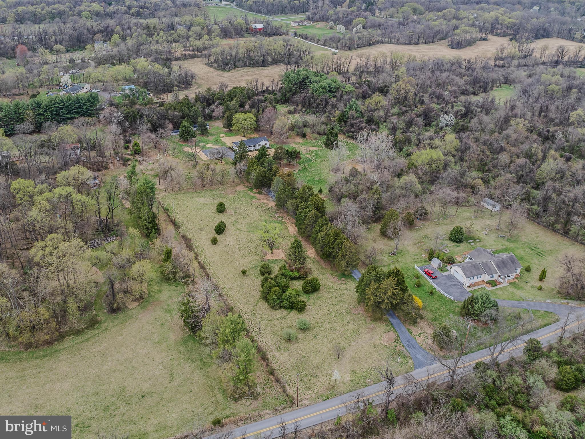 89 Morgan Grove Road Shepherdstown, WV 25443 - Photo 55 of 68 an aerial view of a house with a yard