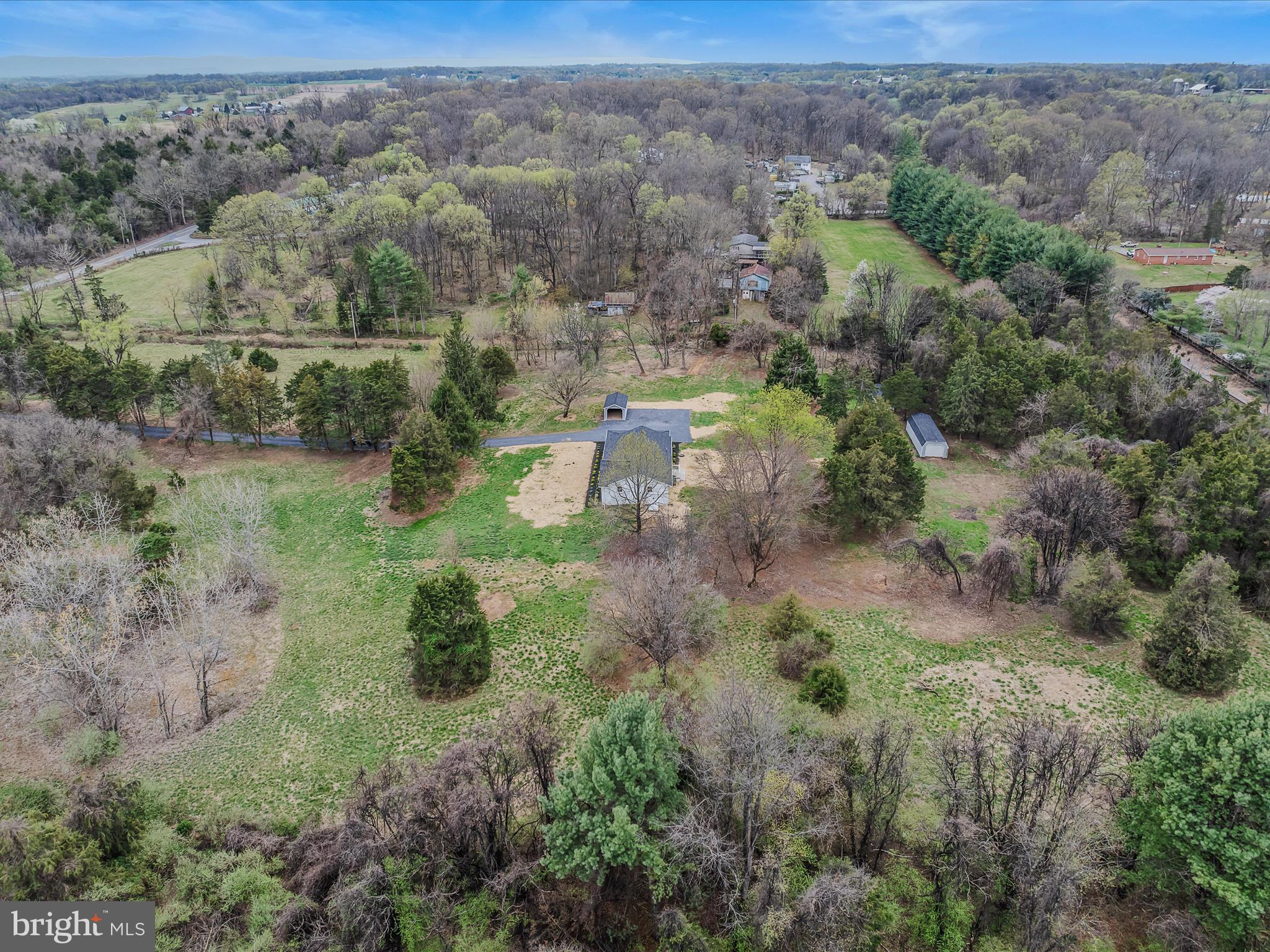 89 Morgan Grove Road Shepherdstown, WV 25443 - Photo 58 of 68 an aerial view of a house with a yard