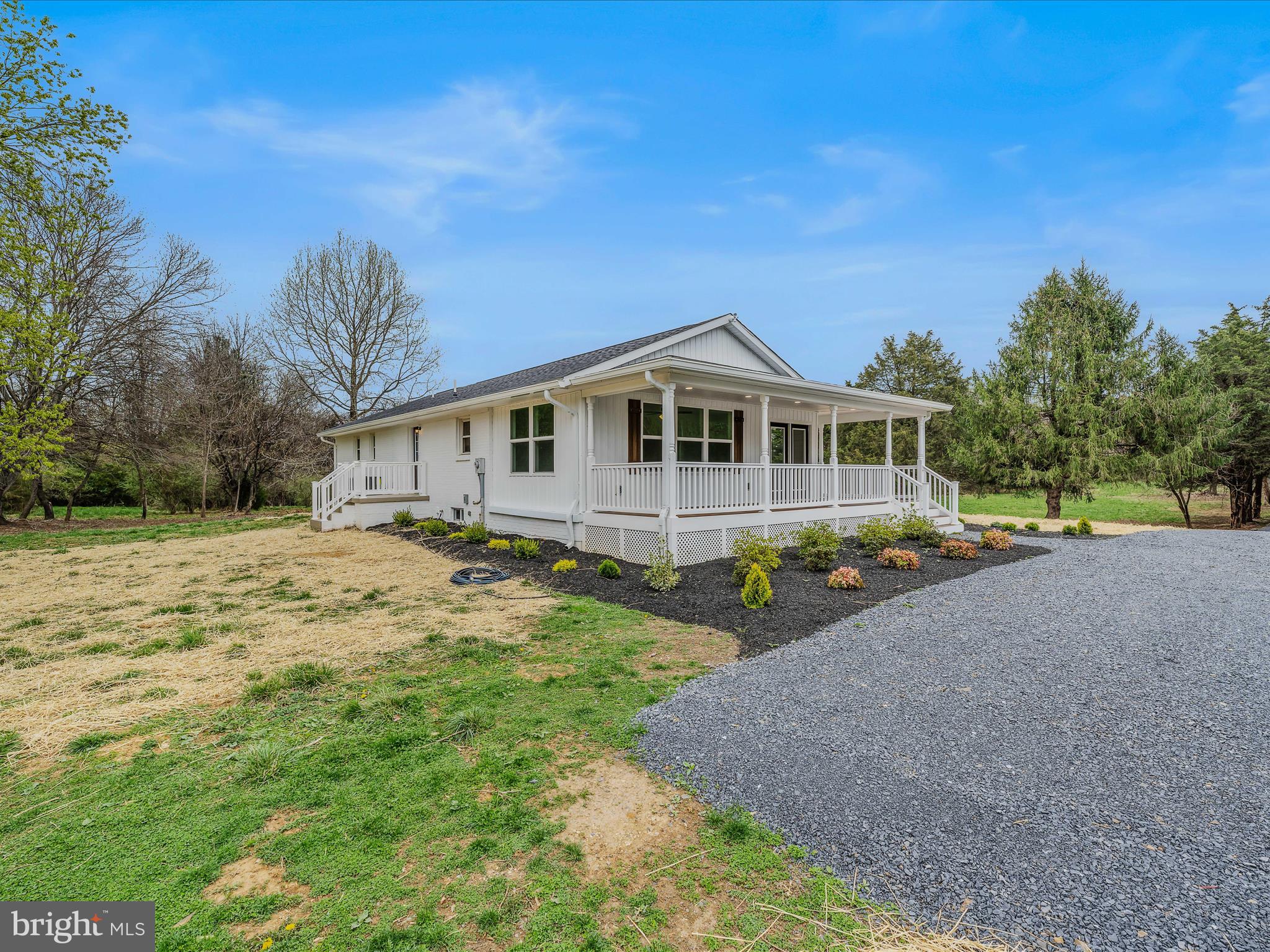 89 Morgan Grove Road Shepherdstown, WV 25443 - Photo 6 of 68 a view of a house with a yard