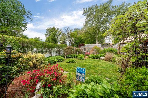 5 Leo Terrace Bloomfield, NJ 07003 - Photo 29 of 32 a view of a garden with plants and large trees
