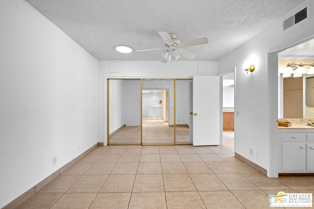2033 Ramon Road, Unit 2C Palm Springs, CA 92264 - Photo 20 of 35 a view of an empty room and window
