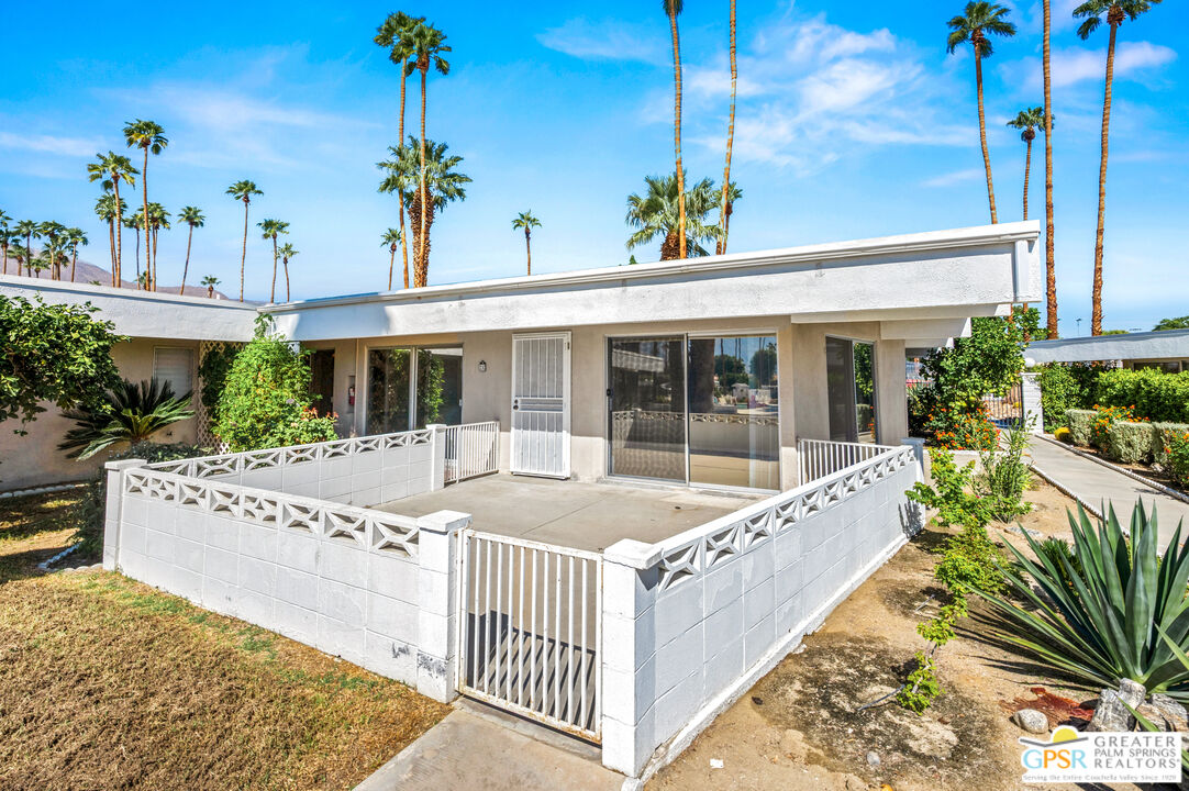 2033 Ramon Road, Unit 2C Palm Springs, CA 92264 - Photo 2 of 35 a view of a house with a potted plant