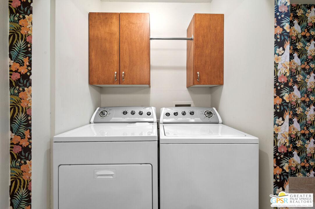 2033 Ramon Road, Unit 2C Palm Springs, CA 92264 - Photo 30 of 35 a utility room with dryer and washer