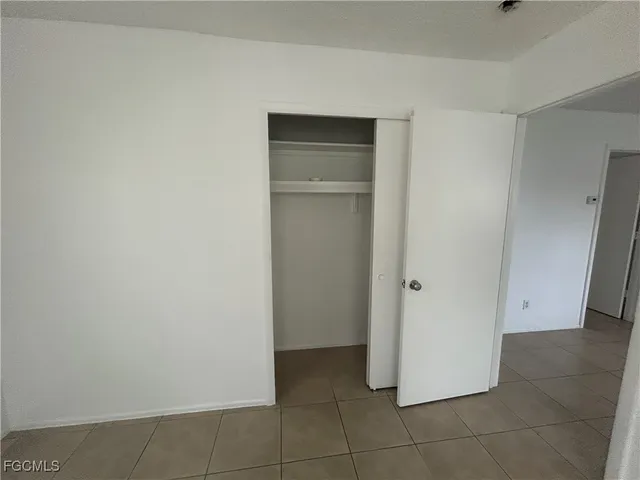 a view of a closet in a room