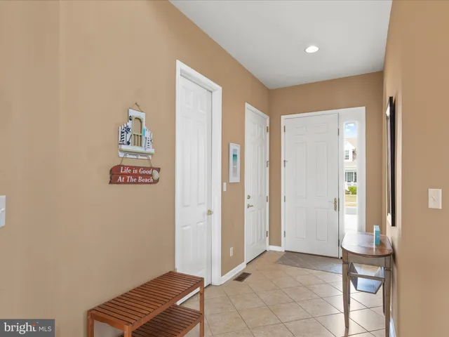 a view of room with window and hallway