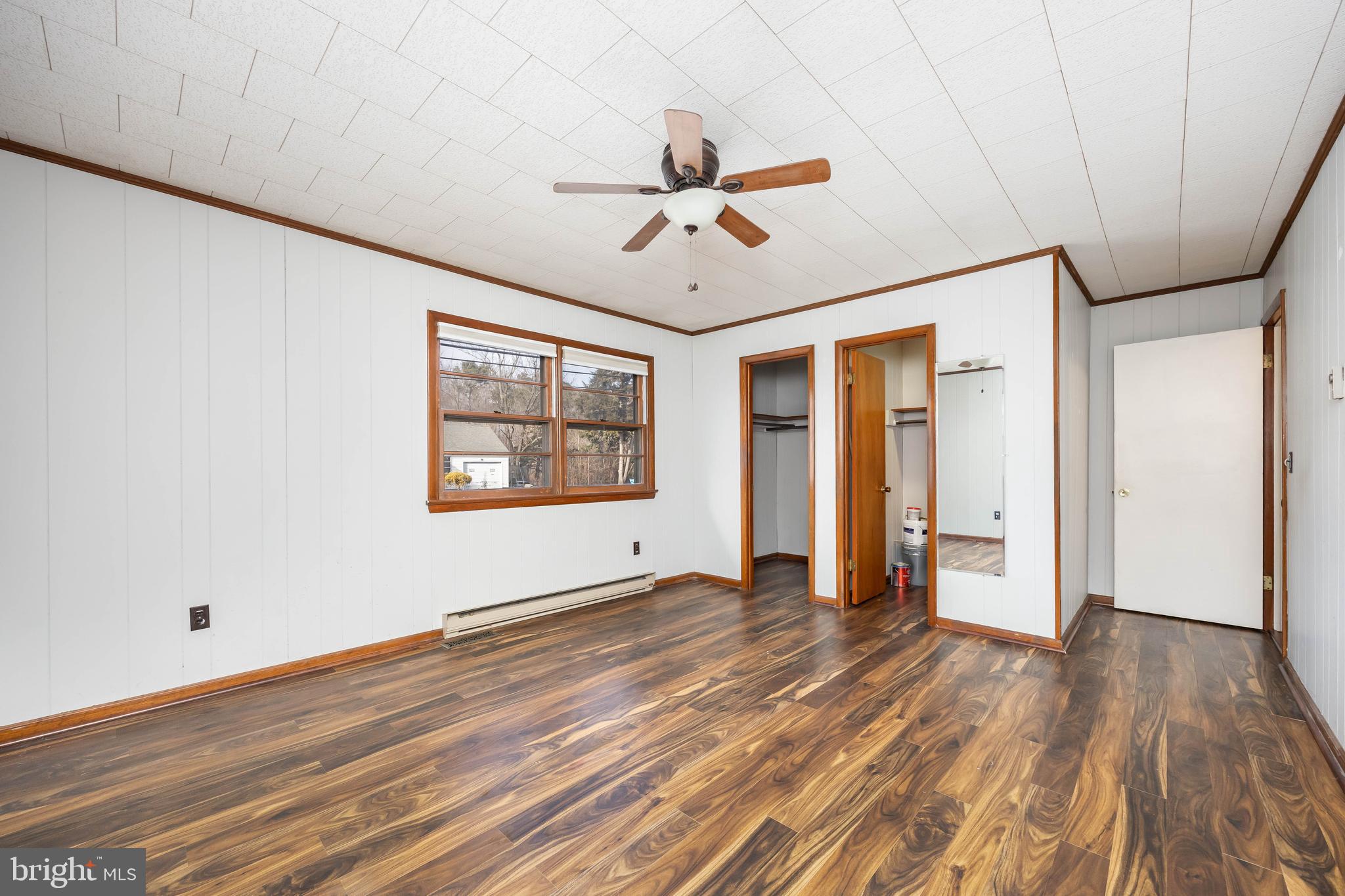 310 Zion Road Salisbury, MD 21804 - Photo 29 of 40 a view of an empty room with wooden floor and a window