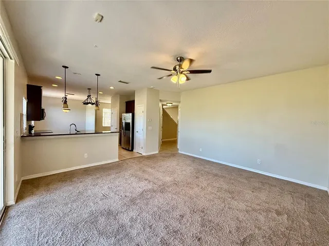 a view of a kitchen with a sink and a kitchen