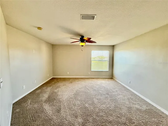 a view of a room with a window