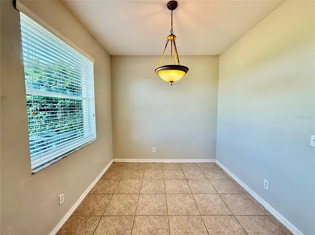 a view of a room with windows