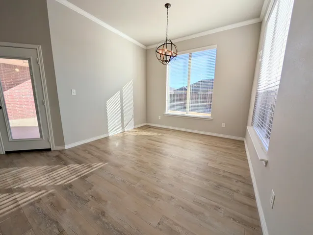 a view of livingroom with hardwood floor and window