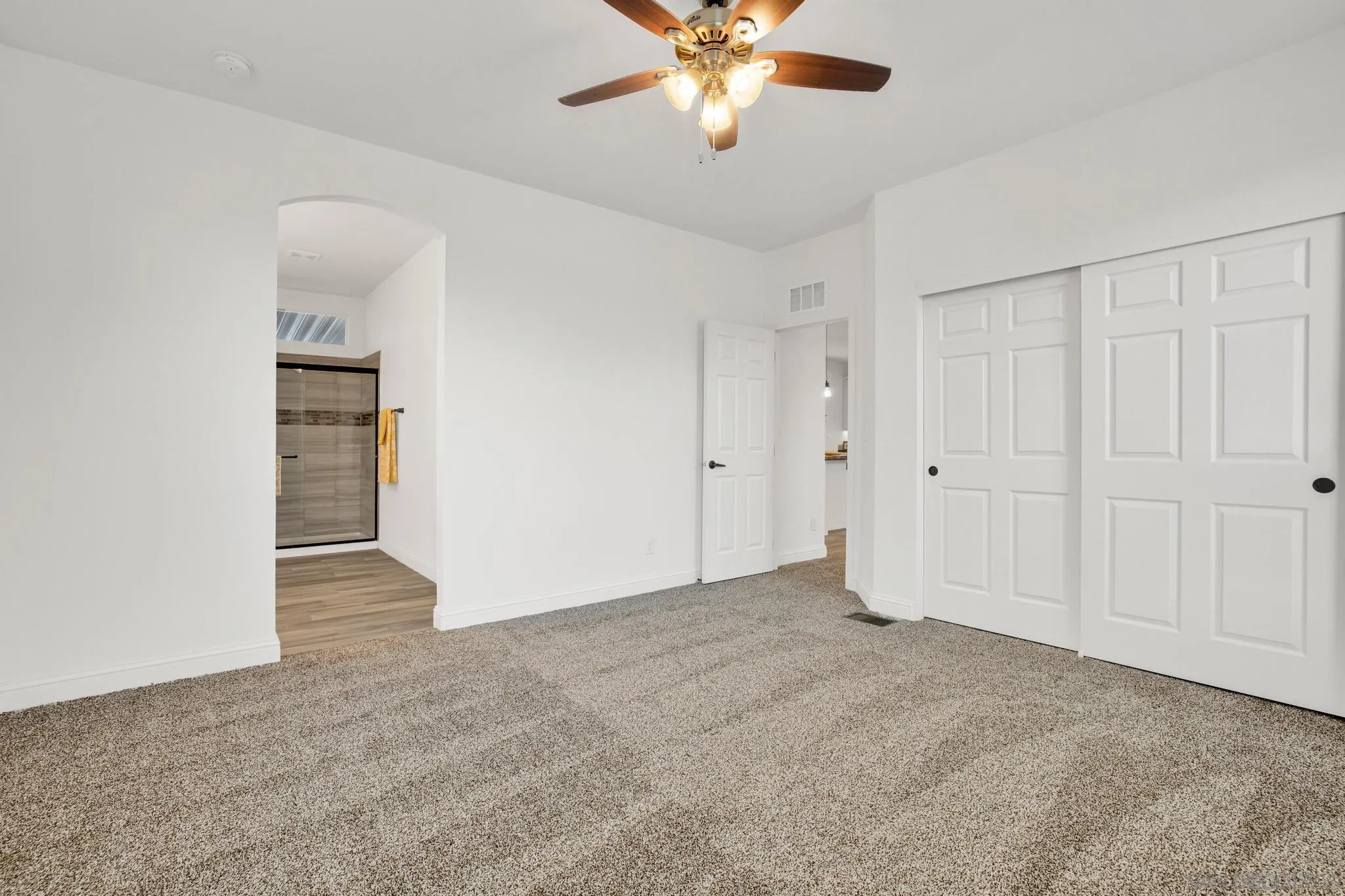 2515 Sweetwater Road, Unit 76 Spring Valley, CA 91977 - Photo 16 of 31 a view of an empty room with a ceiling fan