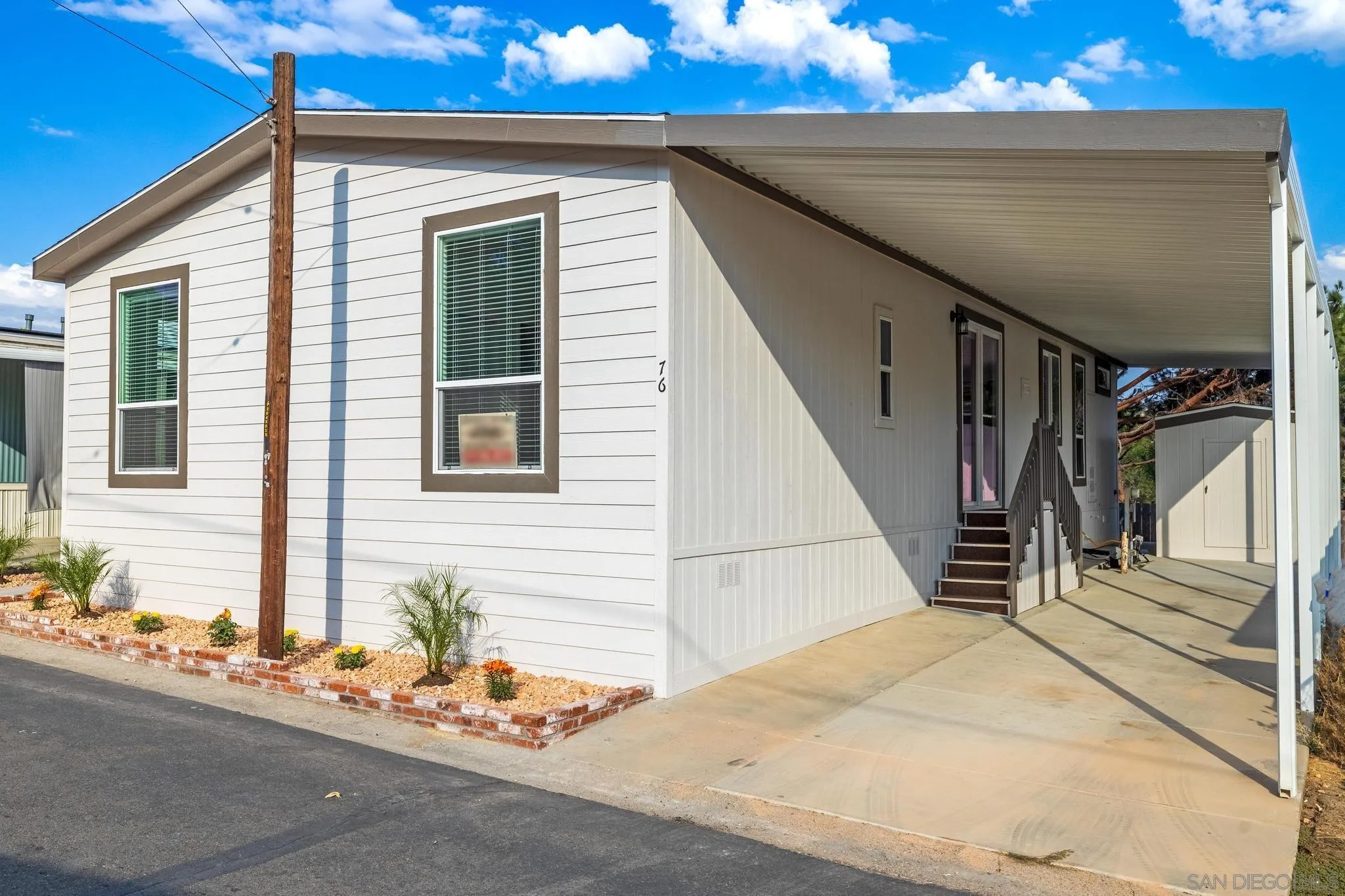 2515 Sweetwater Road, Unit 76 Spring Valley, CA 91977 - Photo 2 of 31 a view of a entryway door front of house