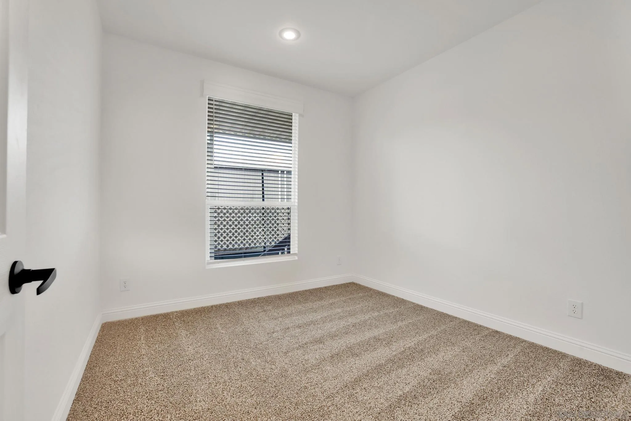 2515 Sweetwater Road, Unit 76 Spring Valley, CA 91977 - Photo 21 of 31 an empty room with a window