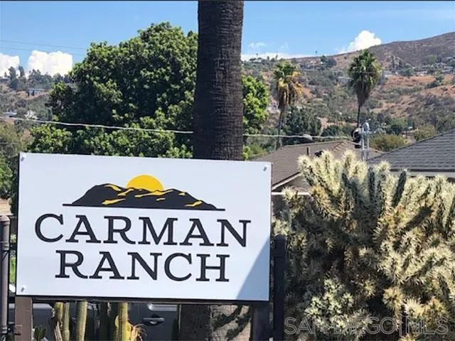 2515 Sweetwater Road, Unit 76 Spring Valley, CA 91977 - Photo 31 of 31 a view of a sign under a tree
