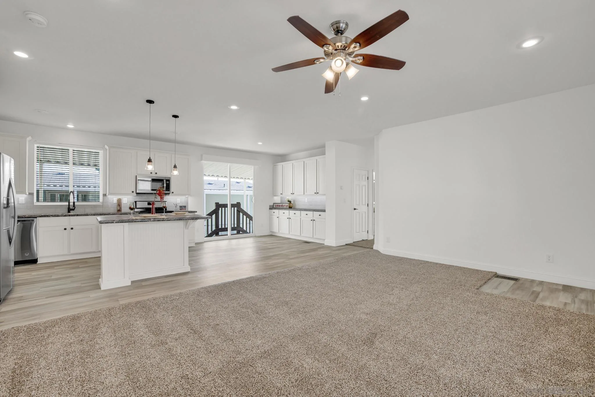2515 Sweetwater Road, Unit 76 Spring Valley, CA 91977 - Photo 5 of 31 a view of kitchen with center island and stainless steel appliances