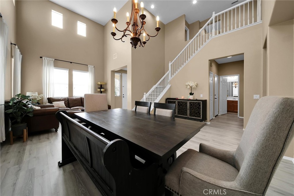 28440 Ware Street Murrieta, CA 92563 - Photo 11 of 72 a kitchen with a table chairs stove and kitchen view