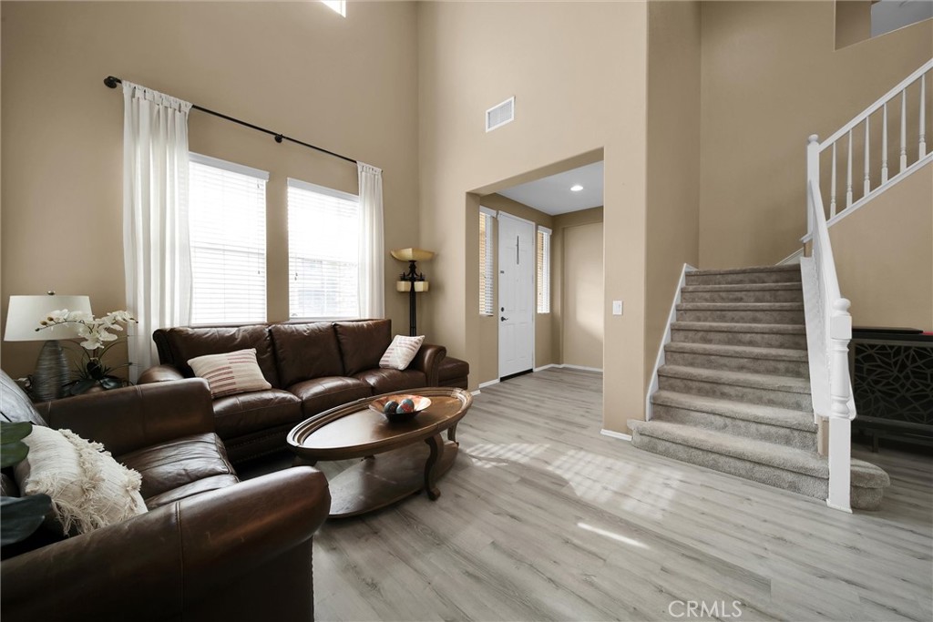 28440 Ware Street Murrieta, CA 92563 - Photo 12 of 72 a living room with furniture and wooden floor