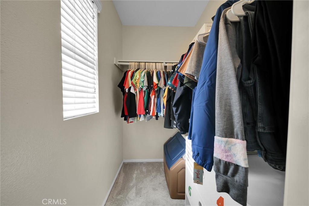 28440 Ware Street Murrieta, CA 92563 - Photo 28 of 72 a view of walk in closet with clothes and shoes