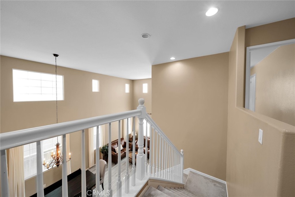 28440 Ware Street Murrieta, CA 92563 - Photo 31 of 72 a view of a hallway with wooden floor