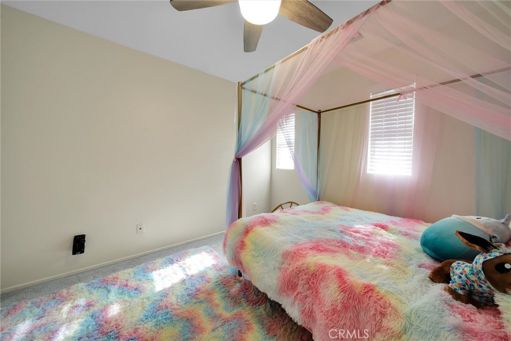 28440 Ware Street Murrieta, CA 92563 - Photo 38 of 72 a bedroom with a bed and a window