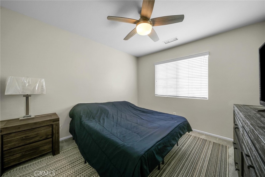 28440 Ware Street Murrieta, CA 92563 - Photo 40 of 72 a bedroom with a bed and a window