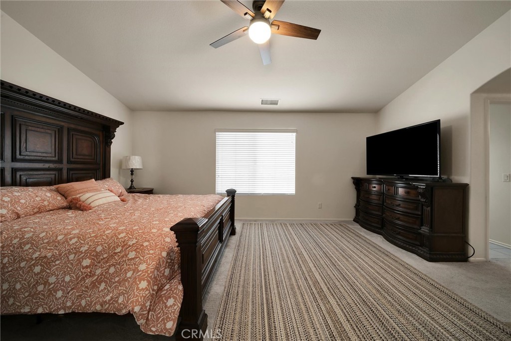 28440 Ware Street Murrieta, CA 92563 - Photo 44 of 72 a bedroom with a bed and a flat screen tv