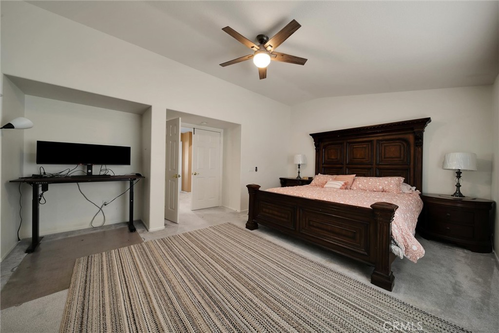 28440 Ware Street Murrieta, CA 92563 - Photo 47 of 72 a bedroom with a bed and a flat screen tv