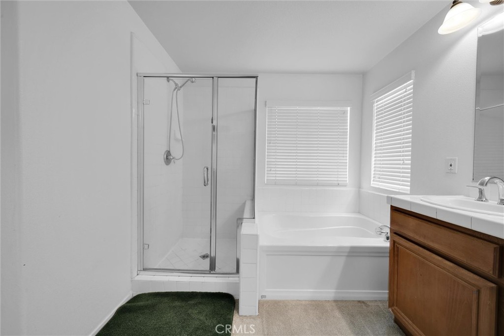 28440 Ware Street Murrieta, CA 92563 - Photo 51 of 72 a bathroom with a bathtub and a sink