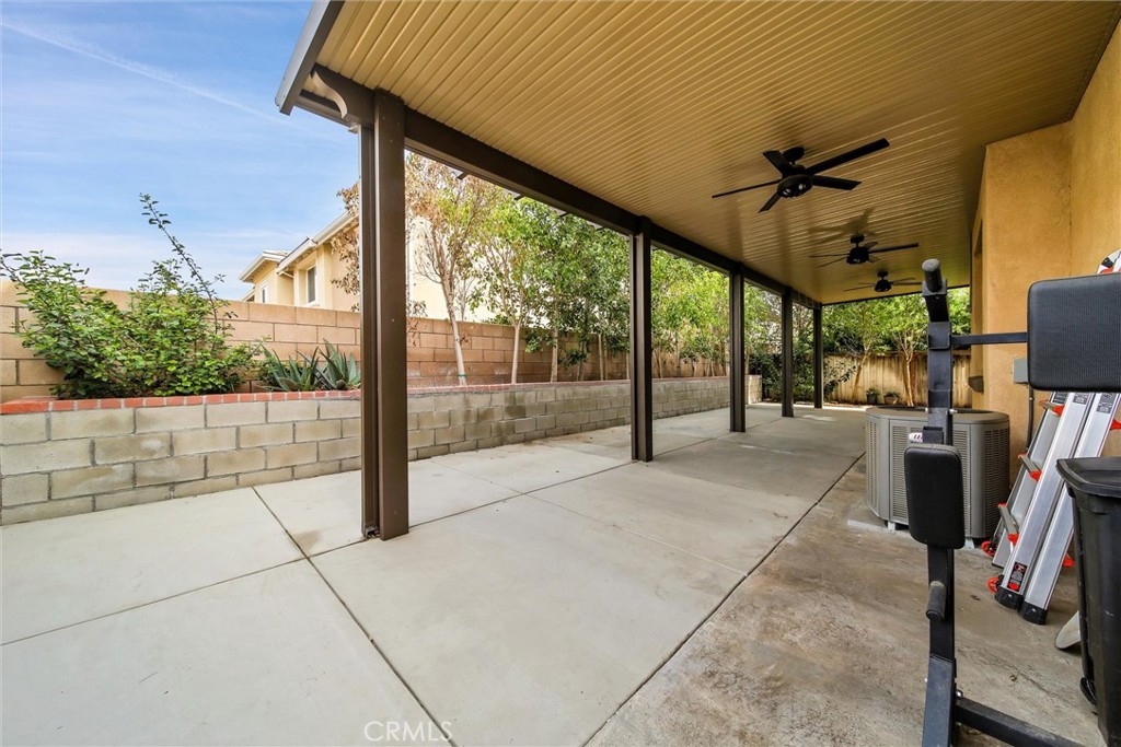 28440 Ware Street Murrieta, CA 92563 - Photo 60 of 72 a view of a porch with furniture and a yard