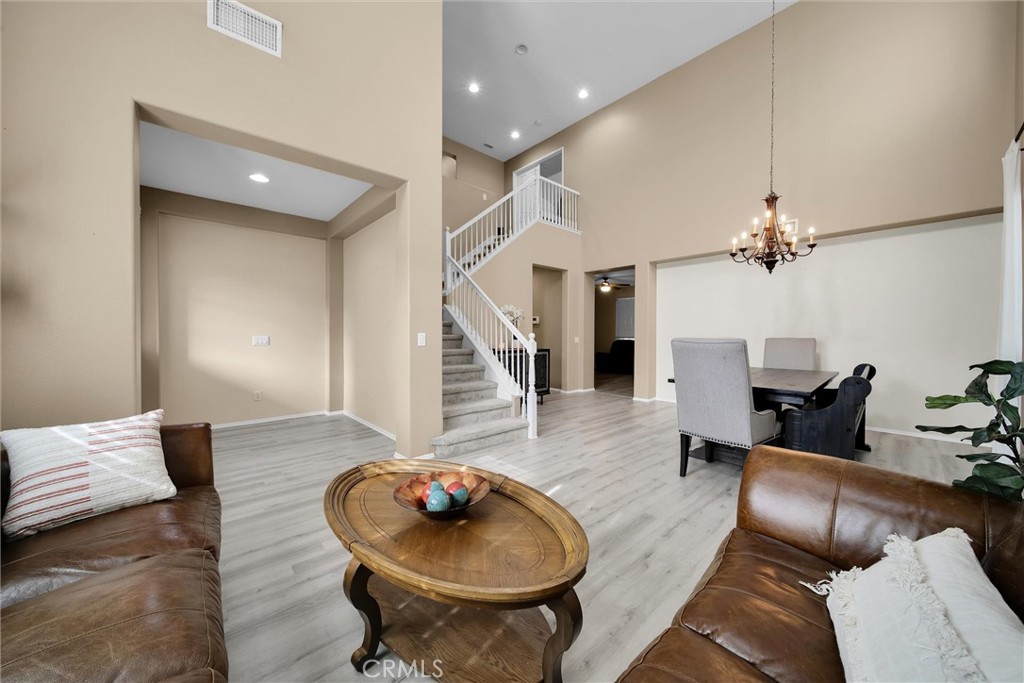 28440 Ware Street Murrieta, CA 92563 - Photo 6 of 72 a living room with furniture and a wooden floor