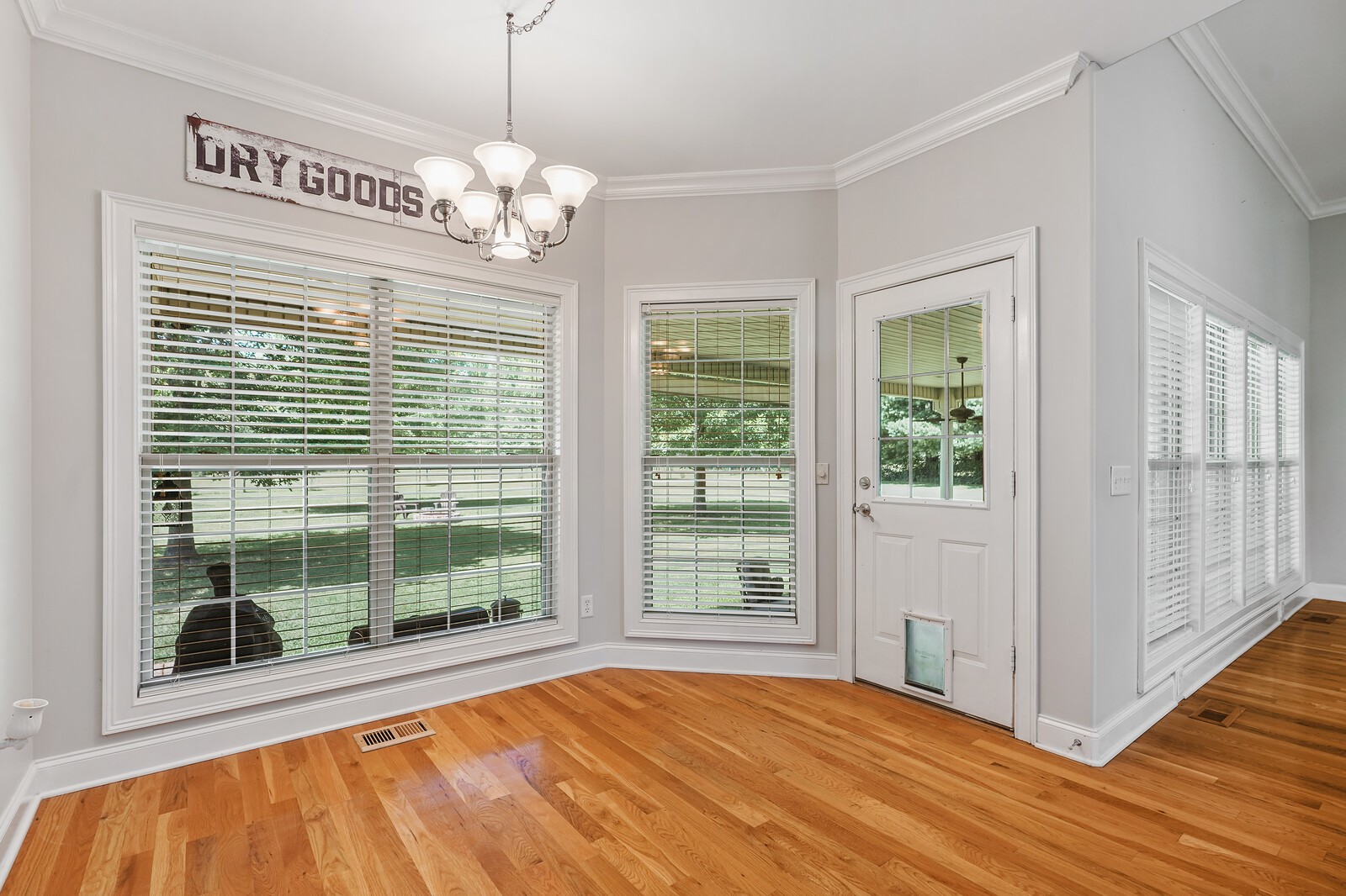 4221 Mt Zion Road Springfield, TN 37172 - Photo 21 of 36 a view of an empty room with a window and wooden floor