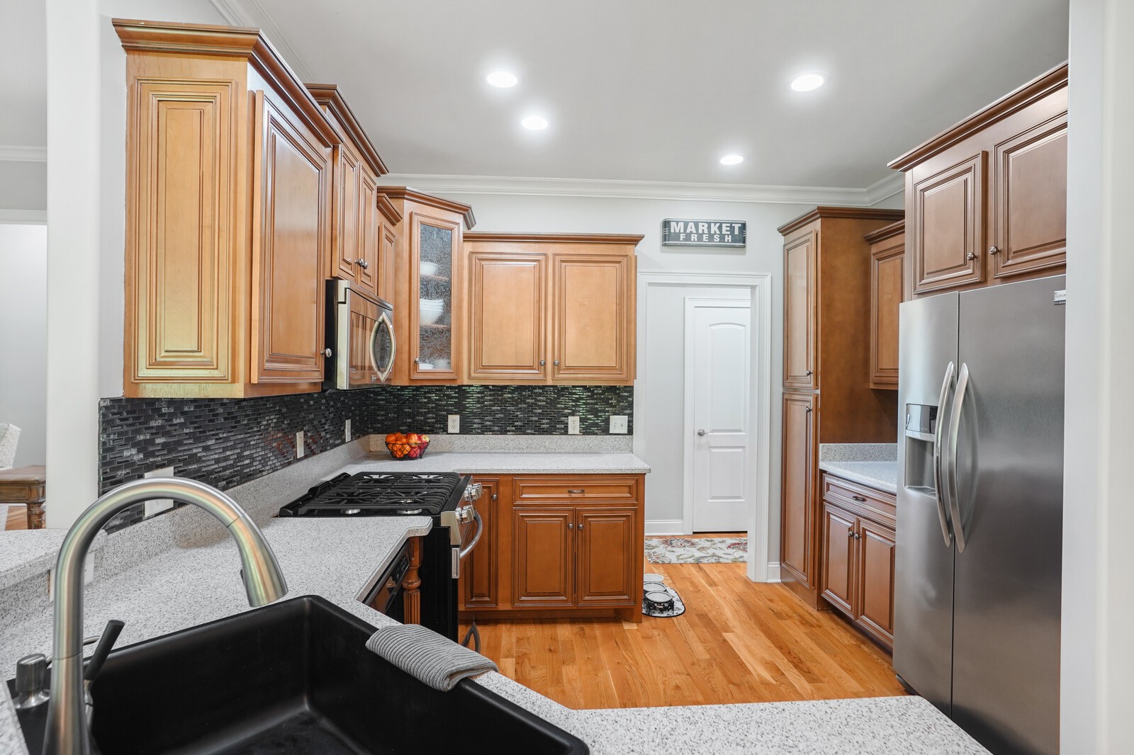 4221 Mt Zion Road Springfield, TN 37172 - Photo 22 of 36 a kitchen with a refrigerator and a sink