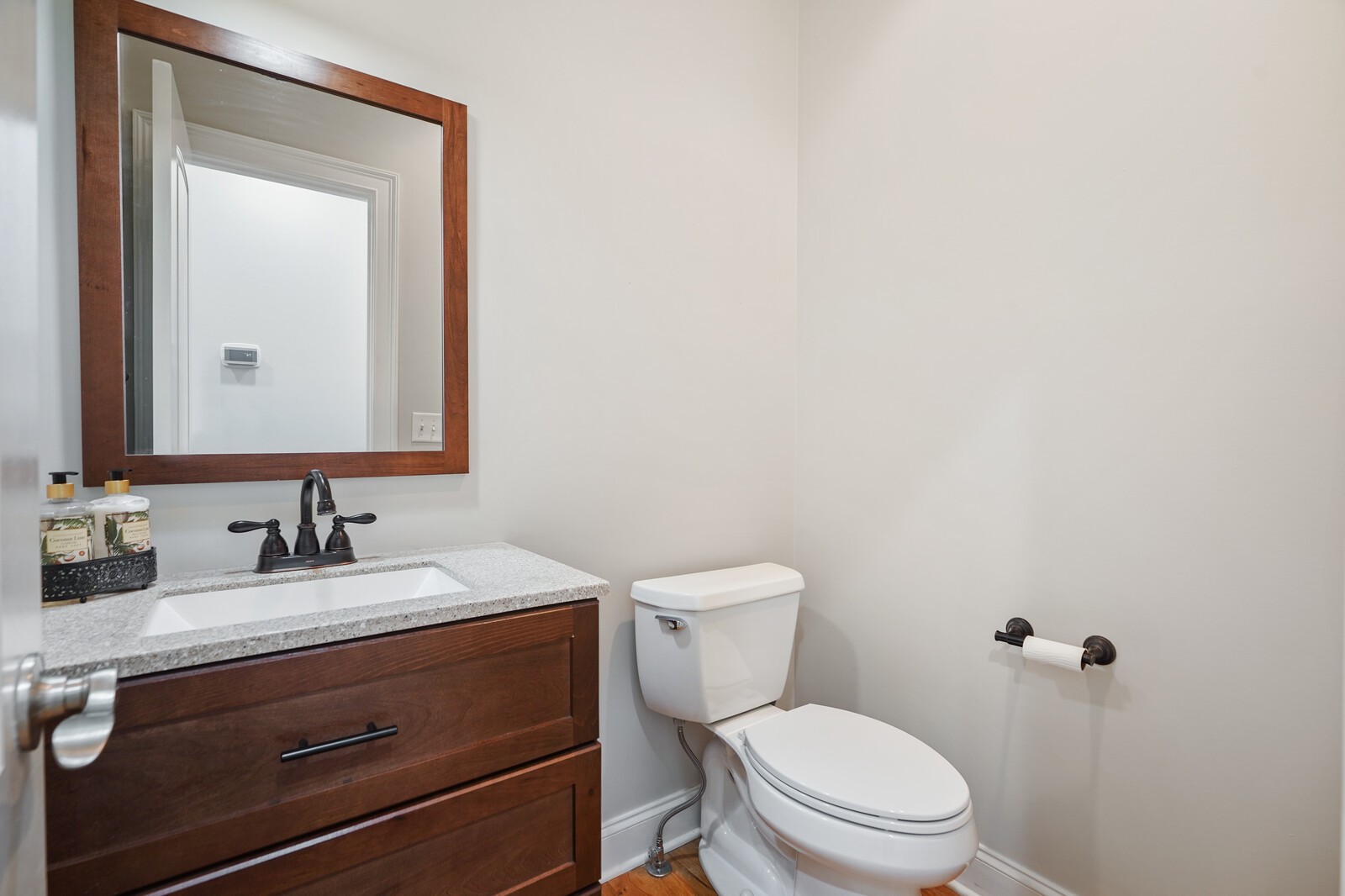 4221 Mt Zion Road Springfield, TN 37172 - Photo 25 of 36 a bathroom with a toilet sink and mirror