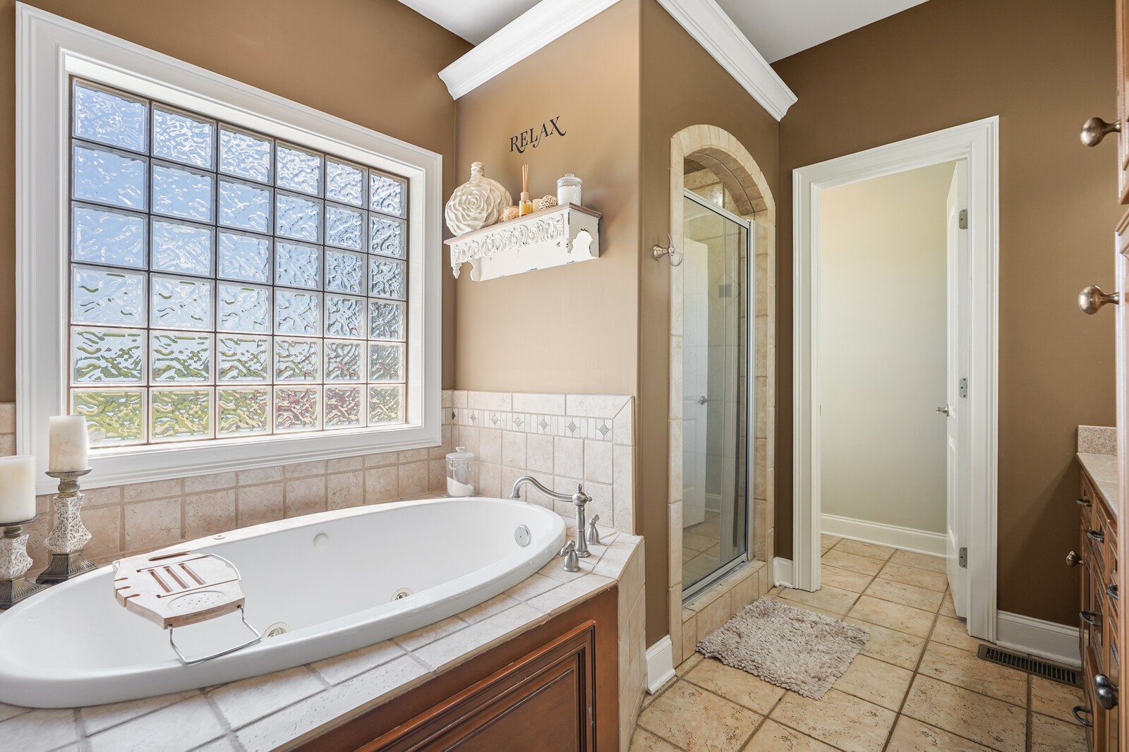 4221 Mt Zion Road Springfield, TN 37172 - Photo 28 of 36 a bathroom with a tub a sink and a window