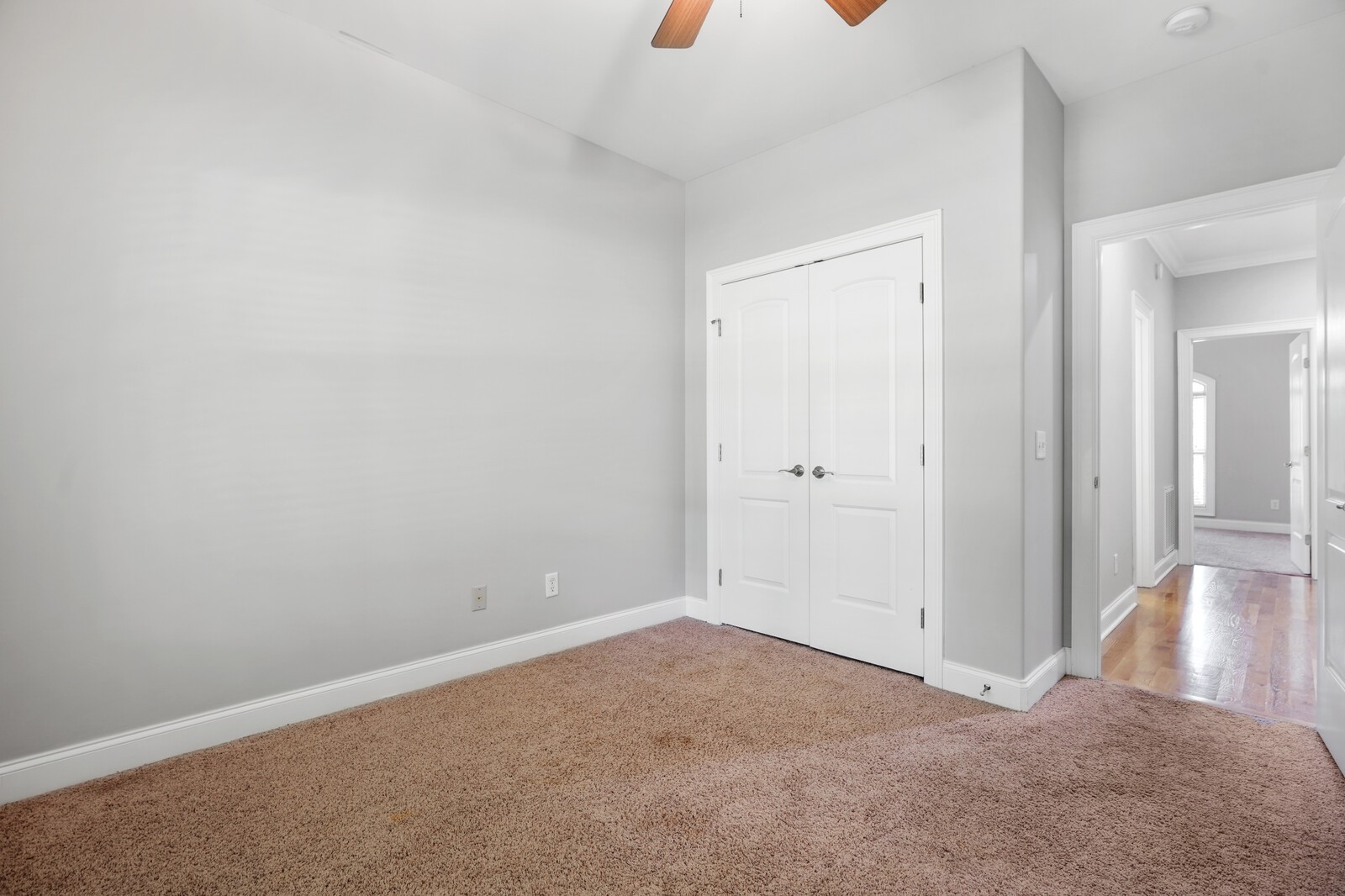 4221 Mt Zion Road Springfield, TN 37172 - Photo 36 of 36 an empty room with wooden floor and windows