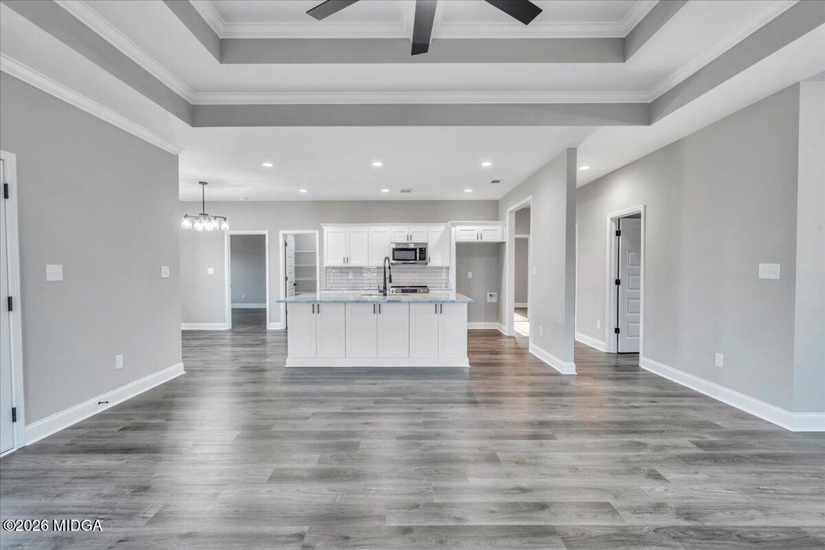 208 Eric Court Byron, GA 31008 - Photo 19 of 57 19 - Living Room with Kitchen View
