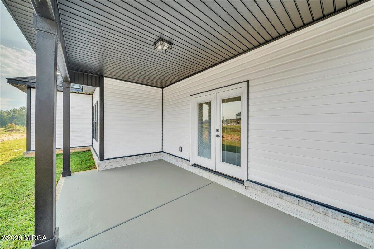 208 Eric Court Byron, GA 31008 - Photo 49 of 57 a view of an empty room with a balcony